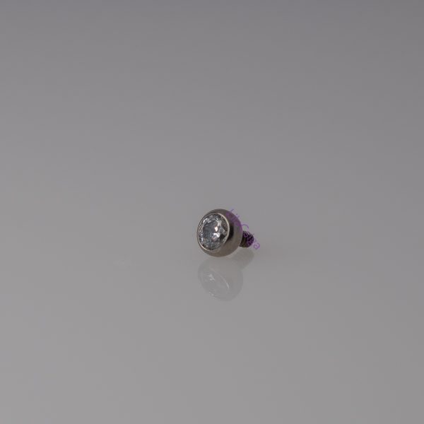 Titán piercing golyó átlátszó CZ kristállyal, belső menetes szárhoz (1.2 mm)