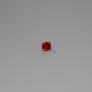 Garnet színű, prong foglalatos piercing fejrész titán foglalatban.